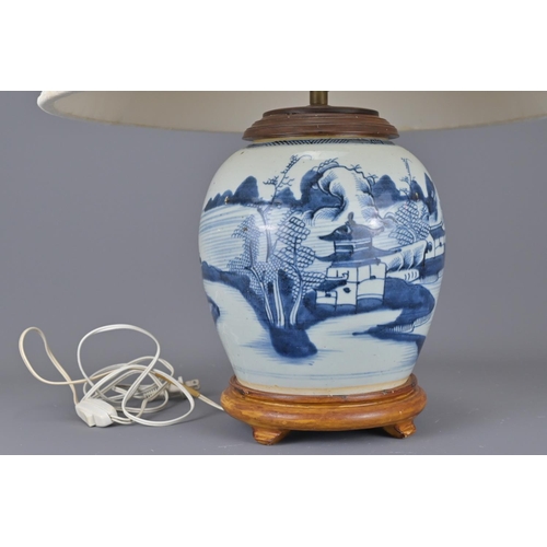 324 - An 18th century chinese blue and white porcelain vase converted into a lamp. together with pleated s... 