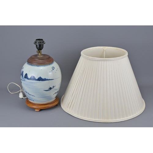 324 - An 18th century chinese blue and white porcelain vase converted into a lamp. together with pleated s... 