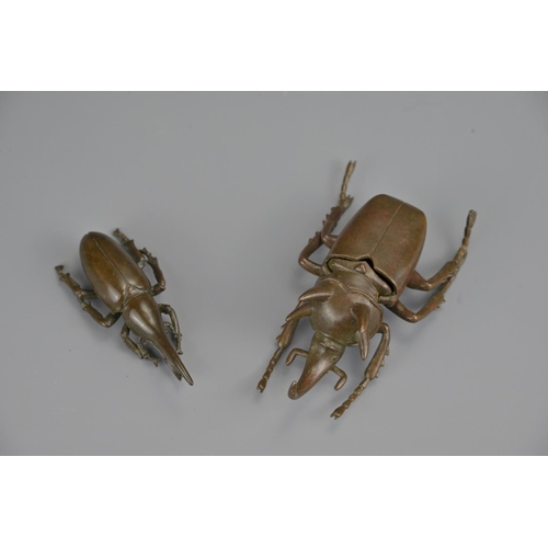 329 - Two japanese late meiji period bronze beetles. larger with opening box cover. each signed underneath... 