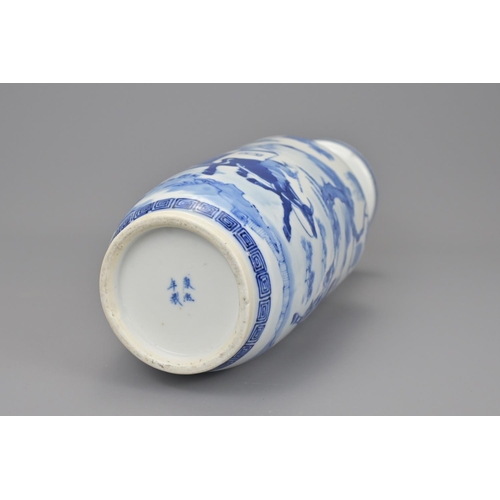 34 - A chinese blue and white porcelain rouleau vase. with four character kangxi mark. 19th century. heig... 