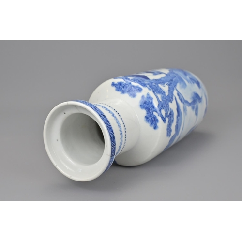 34 - A chinese blue and white porcelain rouleau vase. with four character kangxi mark. 19th century. heig... 