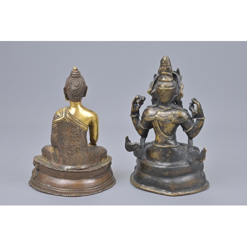 62 - Two asian bronze seated buddhas one with gilt detail. tallest height approx. 18cm (2)