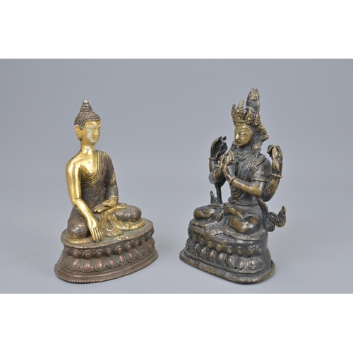 62 - Two asian bronze seated buddhas one with gilt detail. tallest height approx. 18cm (2)