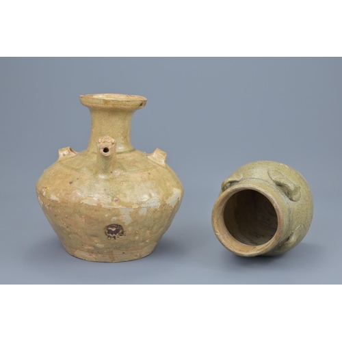 66 - A chinese jin dynasty pottery chicken head ewer and a song dynasty four-looped celadon jar. ewer hei... 