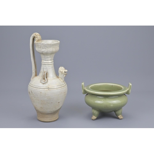 67 - A chinese white glazed chicken head ewer and a celadon tripod censer. ewer height approx. 25cm (2)