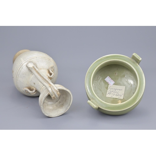 67 - A chinese white glazed chicken head ewer and a celadon tripod censer. ewer height approx. 25cm (2)