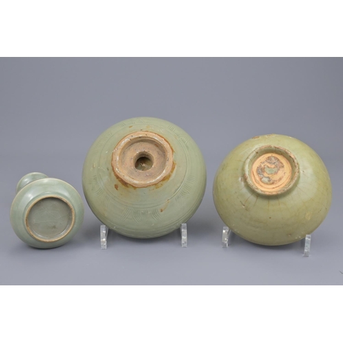 68 - Three chinese longquan celadon items ming dynasty and later including two bowls and a vase. vase hei... 