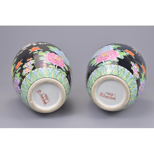 74 - A pair of japanese imari porcelain vases. height approx. 30cm (2)