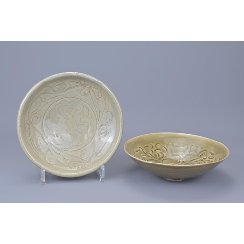 77 - Two chinese celadon bowls including one yaozhou example. yaozhou bowl diameter approx. 19cm (2)