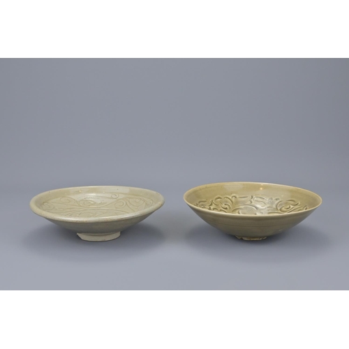 77 - Two chinese celadon bowls including one yaozhou example. yaozhou bowl diameter approx. 19cm (2)