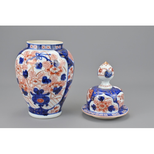 83 - A japanese imari jar and cover. height approx. 35cm