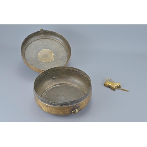 87 - An indian brass hinged box with lion padlock and key. width approx. 23cm