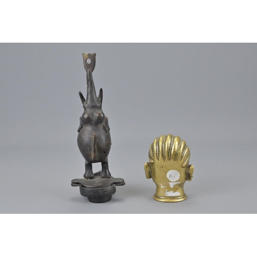 93 - An indian polished bronze head together with an indian bronze elephant. elephant height approx. 22cm... 