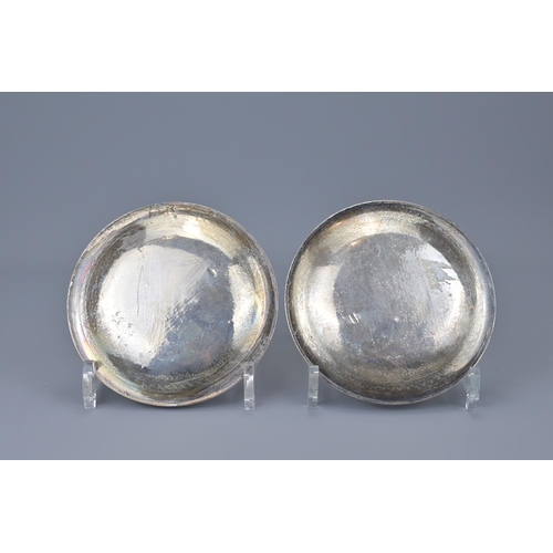 95 - A pair of egyptian silver plates. diameter approx. 13.5cm (2)