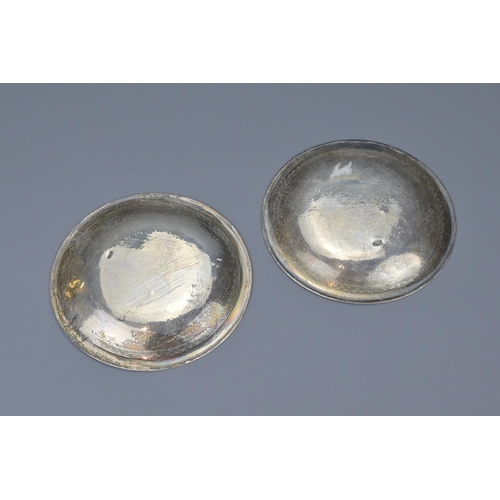 95 - A pair of egyptian silver plates. diameter approx. 13.5cm (2)