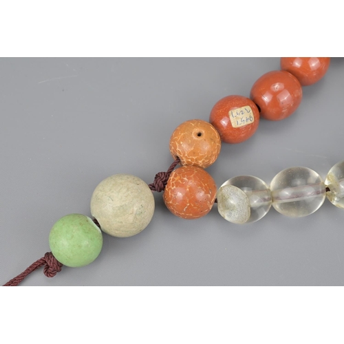 96 - Chinese praying beads including jade and crystal examples. larger bean 3cm diameter