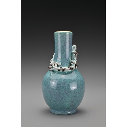 57 - A Chinese 19th Century 'robin's egg'-glazed porcelain bottle vase with a moulded chilong around the ... 