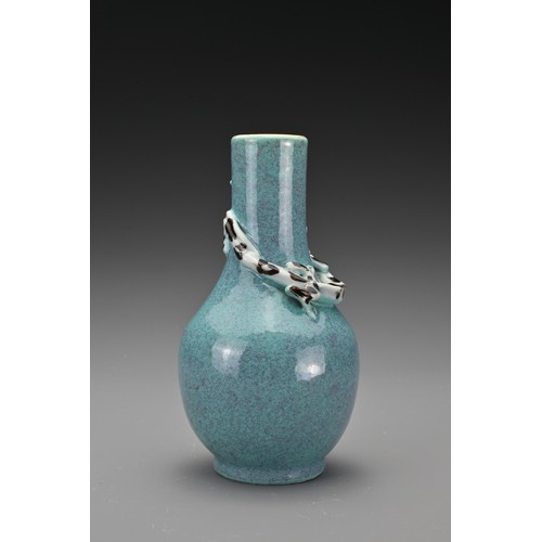 57 - A Chinese 19th Century 'robin's egg'-glazed porcelain bottle vase with a moulded chilong around the ... 