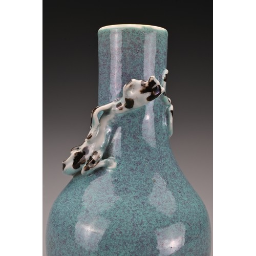 57 - A Chinese 19th Century 'robin's egg'-glazed porcelain bottle vase with a moulded chilong around the ... 