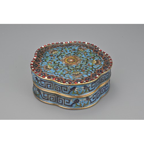 68 - A Chinese 18th Century lobbed cloisonné box and cover. The foliate-shaped box and cover decorated to... 