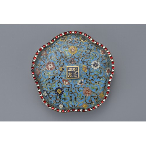 68 - A Chinese 18th Century lobbed cloisonné box and cover. The foliate-shaped box and cover decorated to... 