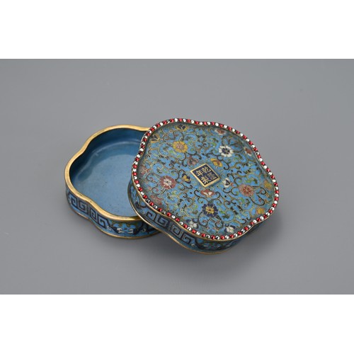 68 - A Chinese 18th Century lobbed cloisonné box and cover. The foliate-shaped box and cover decorated to... 