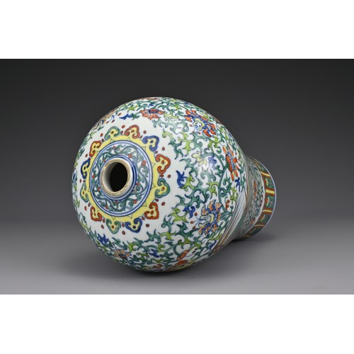 18 - A Chinese 19th Century doucai porcelain vase. The meiping shaped vase decorated with dragon and phoe... 