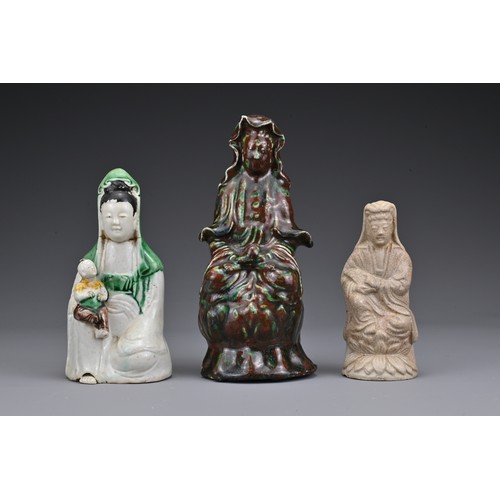 20 - Three Chinese ceramic Guanyin figures. Each in different glazes. Heights 11.5cm - 17.5cm (3)