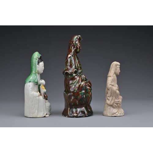 20 - Three Chinese ceramic Guanyin figures. Each in different glazes. Heights 11.5cm - 17.5cm (3)