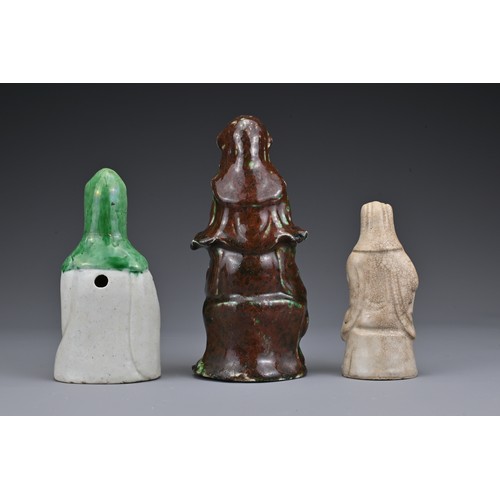 20 - Three Chinese ceramic Guanyin figures. Each in different glazes. Heights 11.5cm - 17.5cm (3)