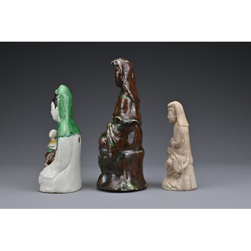 20 - Three Chinese ceramic Guanyin figures. Each in different glazes. Heights 11.5cm - 17.5cm (3)