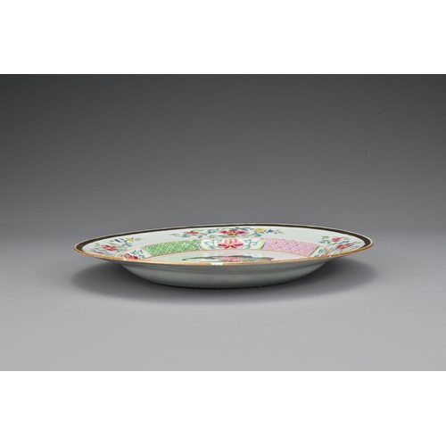 29 - A Chinese 18th Century famille rose porcelain dish. Decorated with Immortal standing on a leaf with ... 