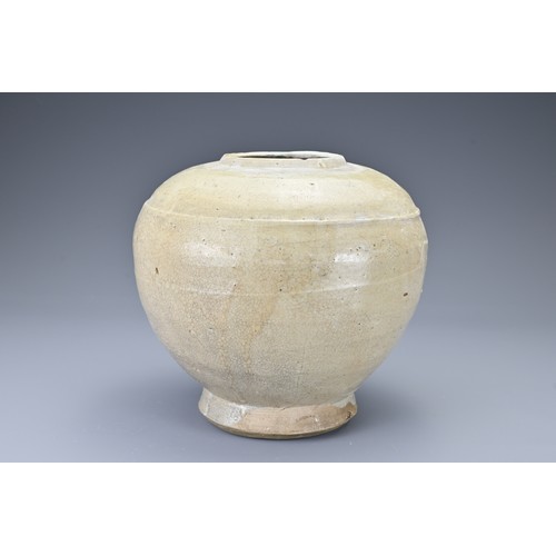 37 - A Southeast Asian stoneware ceramic jar. The globular jar on slightly splayed foot covered in a pale... 