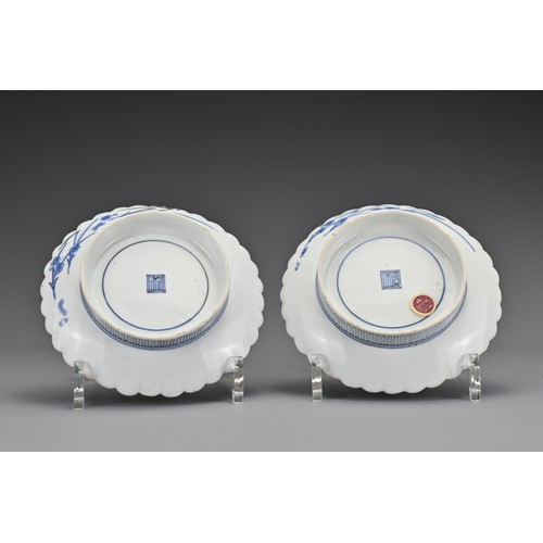 62 - A pair of Japanese Kakiemon blue and white lobbed porcelain dishes. Each dish decorated in underglaz... 