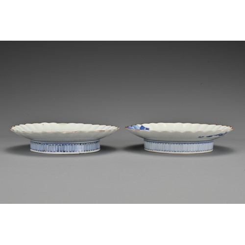 62 - A pair of Japanese Kakiemon blue and white lobbed porcelain dishes. Each dish decorated in underglaz... 