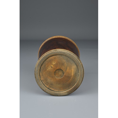 64 - A Chinese Huanghuali wood brush pot with added hardwood rim and base. Height 10.5cm. Diam. 9cm