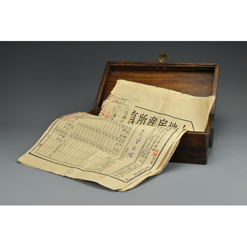 72 - A Chinese hardwood rectangular form box with metal handles and fittings. Together with six printed C... 