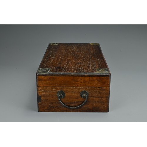 72 - A Chinese hardwood rectangular form box with metal handles and fittings. Together with six printed C... 