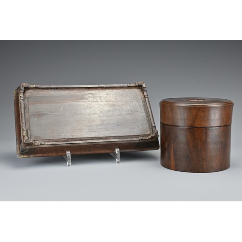 73 - A Chinese hardwood cylindrical box and cover together with a hardwood tray on four feet with metal f... 