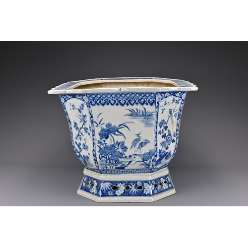 76 - A large Chinese 19th century blue and white porcelain jardiniere. The lobed body with a flat bracket... 