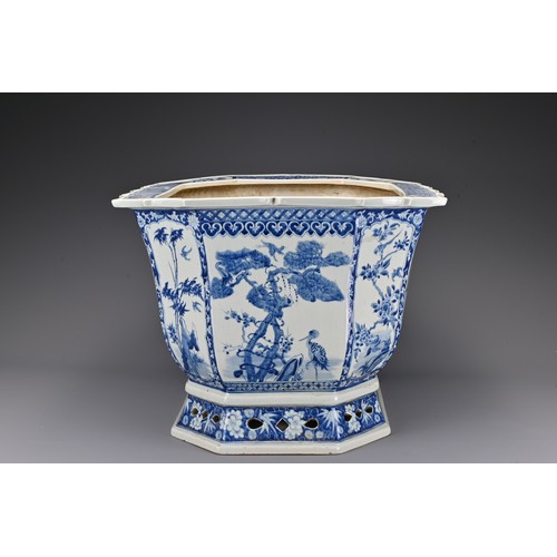 76 - A large Chinese 19th century blue and white porcelain jardiniere. The lobed body with a flat bracket... 