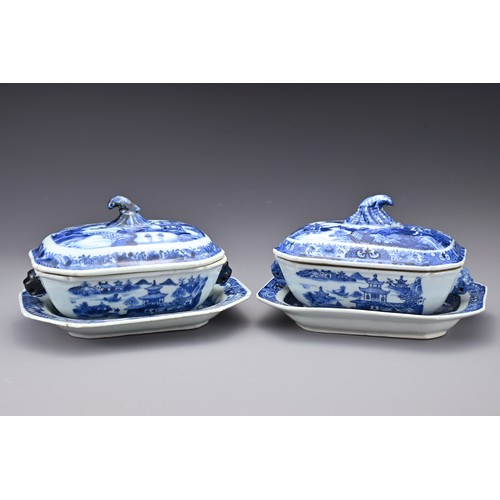 77 - A pair of Chinese 18th Century blue and white porcelain tureens and covers with dishes. The four pie... 