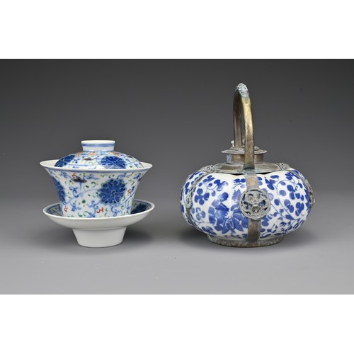 24 - A Chinese doucai porcelain teacup and cover, with stand. Together with a blue and white teapot with ... 