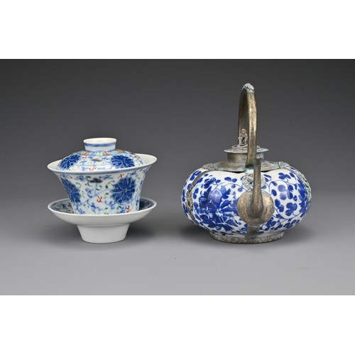 24 - A Chinese doucai porcelain teacup and cover, with stand. Together with a blue and white teapot with ... 