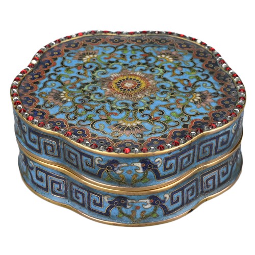 68 - A Chinese 18th Century lobbed cloisonné box and cover. The foliate-shaped box and cover decorated to... 