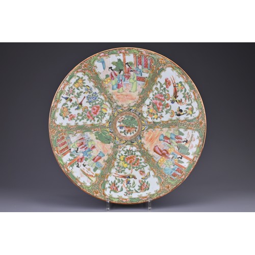2 - A LARGE CHINESE CANTON FAMILLE ROSE PORCELAIN CHARGER, 19TH CENTURY. Decorated in the rose medallion... 