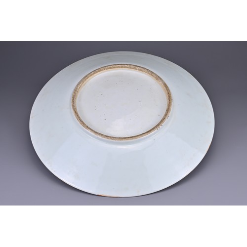 2 - A LARGE CHINESE CANTON FAMILLE ROSE PORCELAIN CHARGER, 19TH CENTURY. Decorated in the rose medallion... 