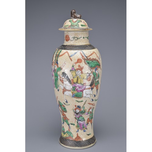 12 - A CHINESE PORCELAIN VASE AND COVER, LATE 19TH CENTURY. The crackle ware vase decorated with polychro... 