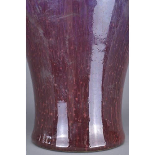 9 - A CHINESE FLAMBE GLAZED MEIPING VASE, 20TH CENTURY. Of typical form covered in a dark purple glaze t... 