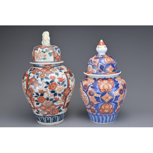 13 - TWO JAPANESE IMARI VASES AND COVERS, 19TH CENTURY. Each of baluster form with floral decoration. 26c... 